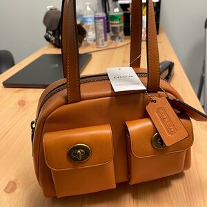 NWT Coach Turnlock 20 in Toffee